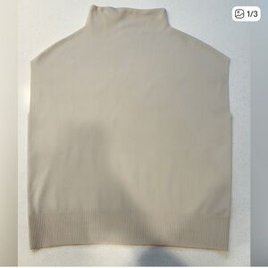 Buttery, soft cream sleeveless sweater